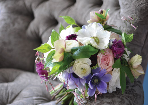 ranunculus, jasmine and anemone bouquet from cover of Seattle Met Bride & Groom 