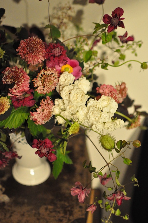 white garden roses, scabiosa and clematis