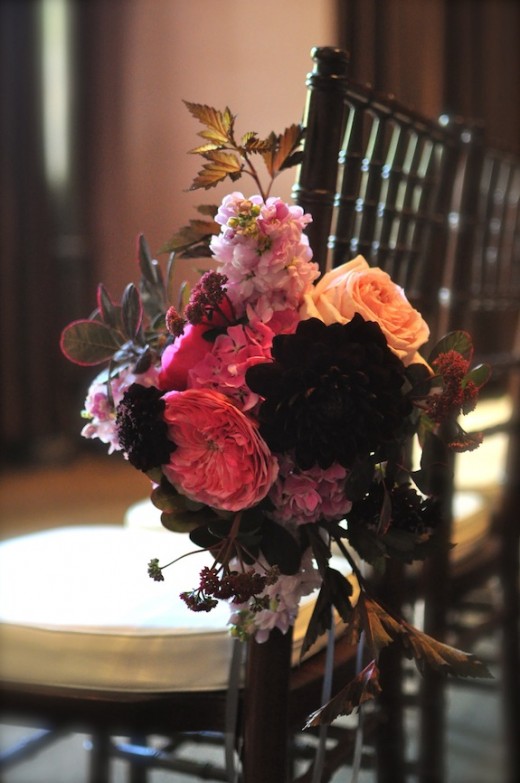 pink and brown chair posy