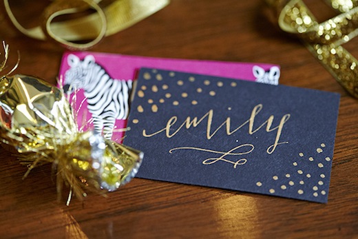 gold calligraphy wedding escort cards favors