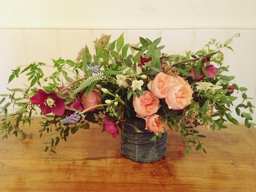 finch.thistle.spring.centerpiece.ranunculus